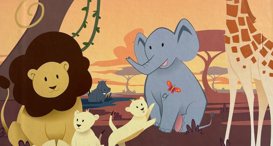 Illustration du thème Jungle – animaux exotiques dessinés dans un décor ensoleillé : lion, girafe, zèbre et éléphant