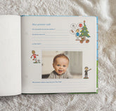 Mon premier Noël” de l’album de naissance foot Antoinette & Louis avec photo de bébé et illustrations festives et sportives