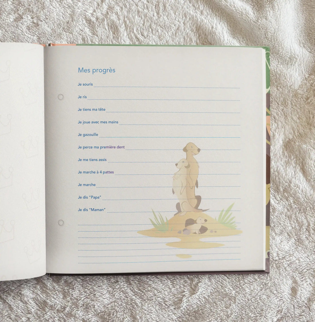 Page « Mes progrès » de l’album photo naissance thème savane Antoinette &amp; Louis, avec illustration de suricates et espace pour noter les étapes clés de bébé