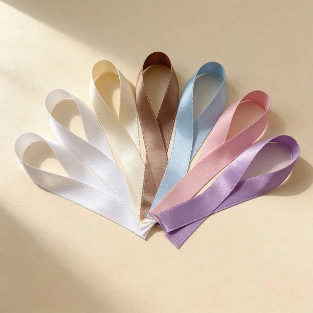 Rubans de satin de plusieurs couleurs pour personnaliser les finitions de l'album